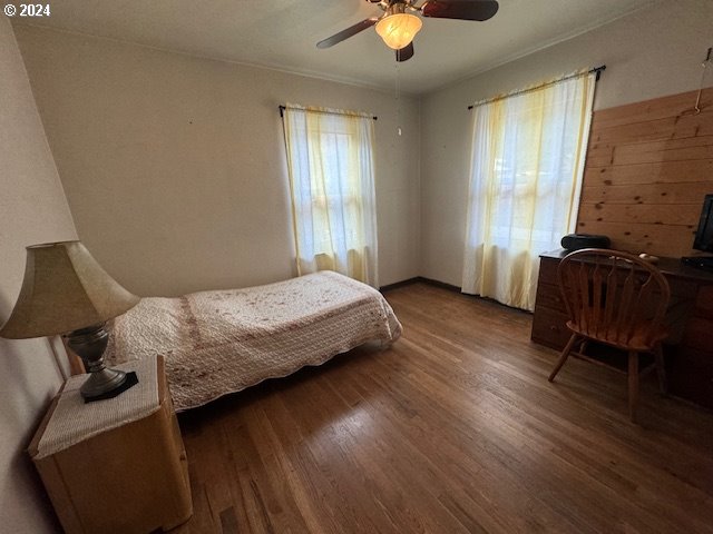 205 N Humbolt St, Canyon City, OR 97820 - bedroom featuring wood finished floors and ceiling fan