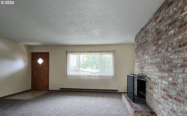 unfurnished living room with carpet flooring, baseboard heating, and a textured ceiling