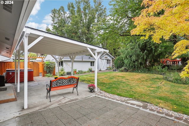 view of patio with a hot tub