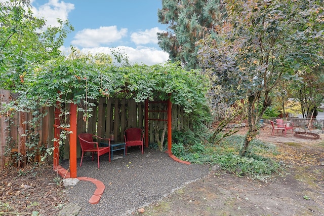view of jungle gym featuring fence