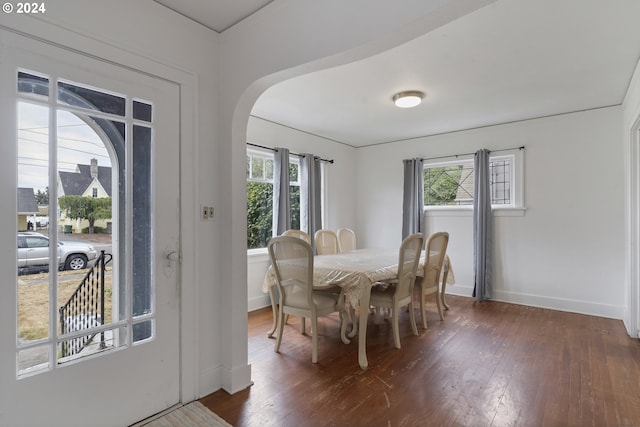 dining area featuring dark hardwood / wood-style floors