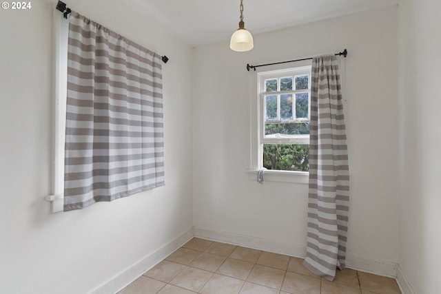 view of tiled spare room