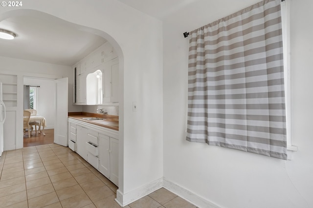 bathroom with vanity and tile patterned floors