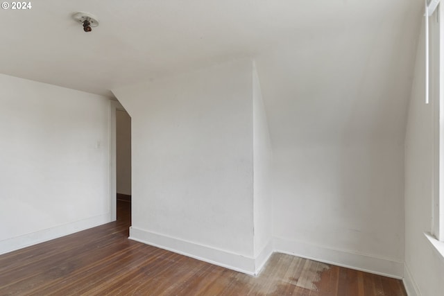 spare room featuring dark hardwood / wood-style floors