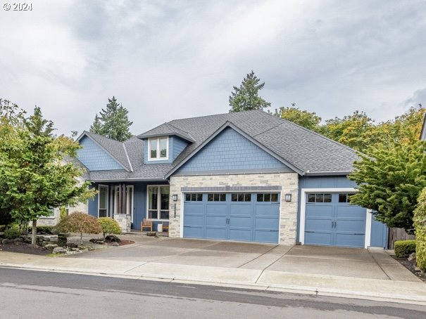 craftsman house with a garage