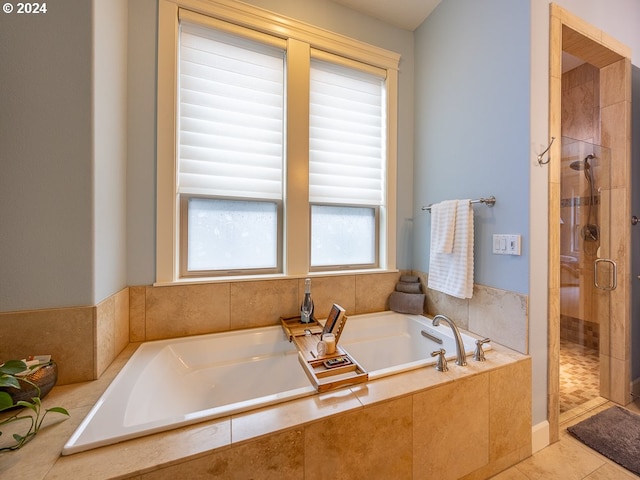 bathroom with tile patterned floors and plus walk in shower