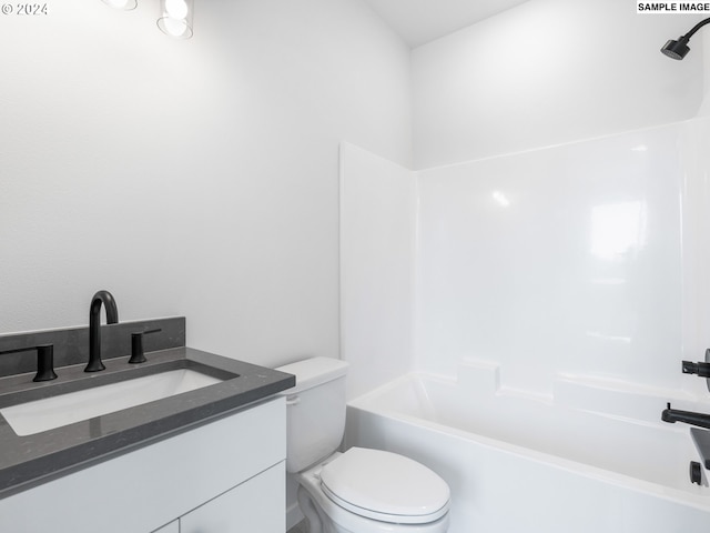 full bathroom featuring vanity, toilet, and bathtub / shower combination