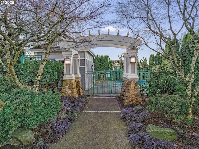 view of gate featuring fence