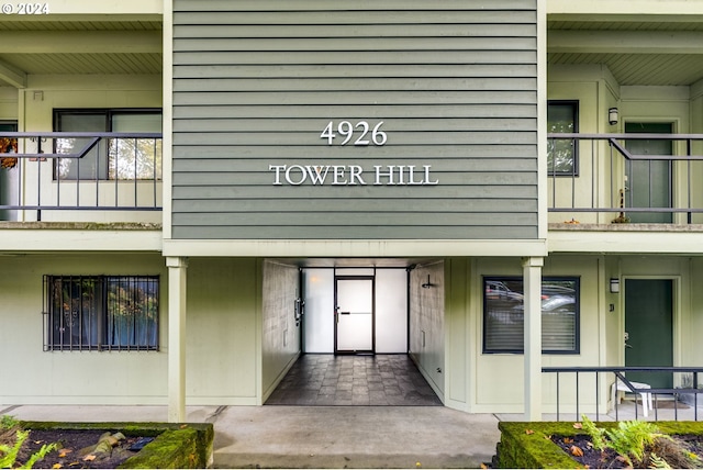 property entrance with a balcony