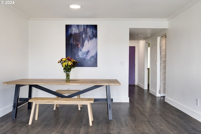 unfurnished dining area with dark wood-type flooring and crown molding