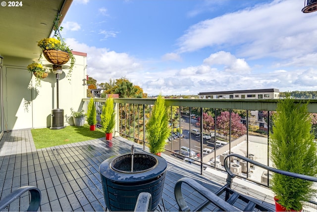 balcony with an outdoor fire pit