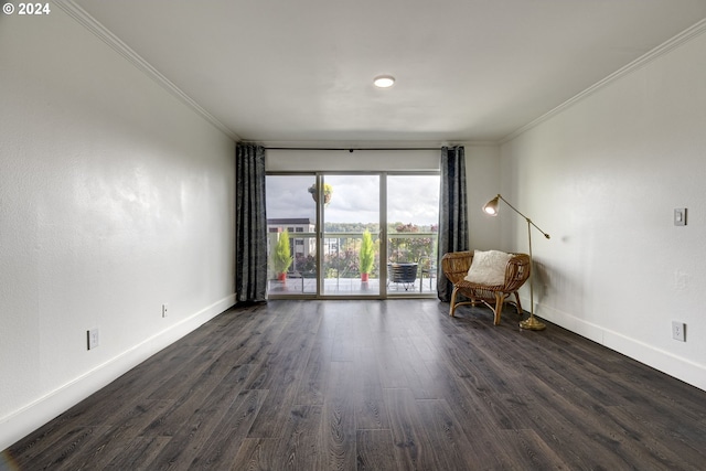 unfurnished room featuring dark wood-type flooring and crown molding