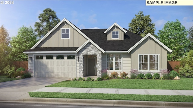 craftsman-style home featuring a front yard and a garage