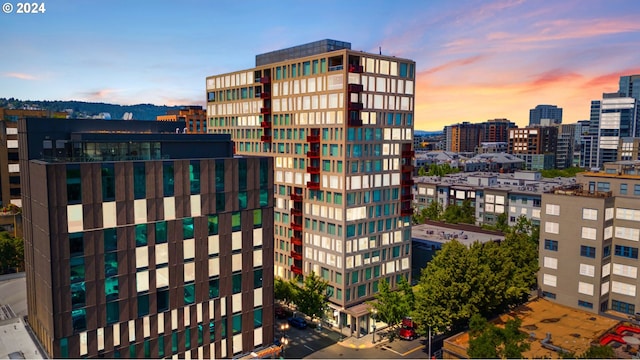 view of outdoor building at dusk