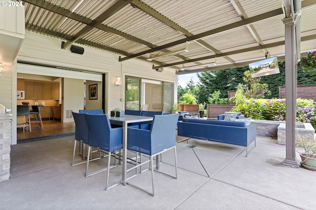 view of patio featuring an outdoor hangout area and outdoor dining space