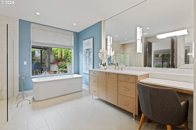 bathroom featuring a tub and vanity