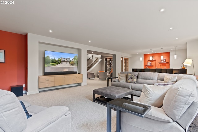carpeted living area featuring stairway, recessed lighting, and baseboards