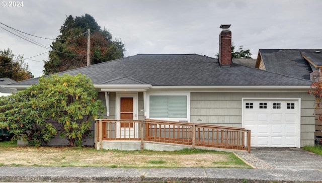 ranch-style house featuring a garage