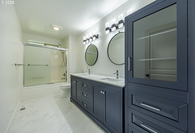 full bath featuring visible vents, a sink, marble finish floor, and double vanity