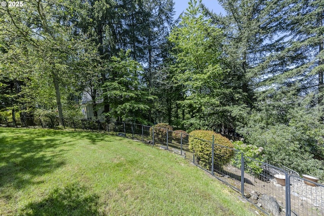 view of yard with fence