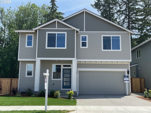 17344 SW Wapato Island Dr Unit 27, Sherwood, OR 97140 - view of front of home featuring concrete driveway and a garage