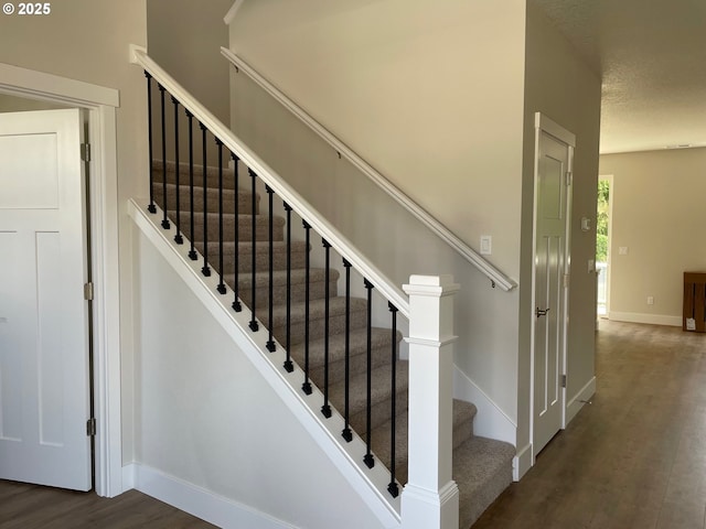 17344 SW Wapato Island Dr Unit 27, Sherwood, OR 97140 - stairway with wood finished floors and baseboards