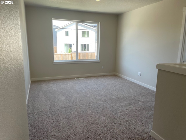 17344 SW Wapato Island Dr Unit 27, Sherwood, OR 97140 - carpeted empty room with baseboards