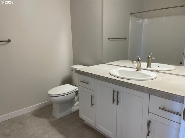 17344 SW Wapato Island Dr Unit 27, Sherwood, OR 97140 - bathroom with vanity, toilet, and baseboards