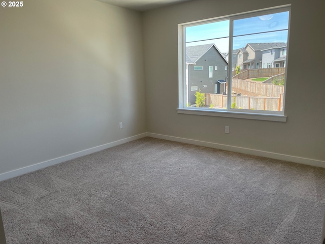 17344 SW Wapato Island Dr Unit 27, Sherwood, OR 97140 - unfurnished room with baseboards and carpet flooring