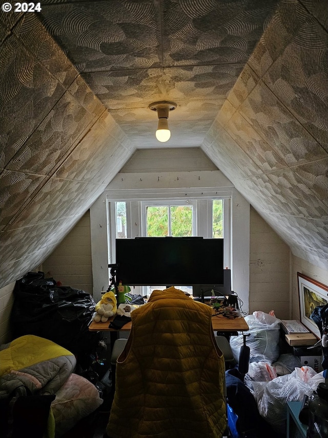 interior space featuring vaulted ceiling