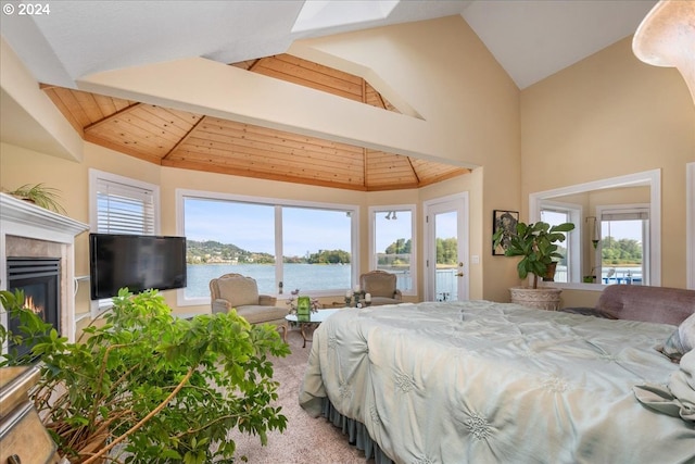 bedroom featuring lofted ceiling and wood ceiling