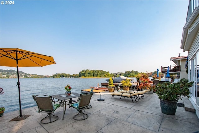 view of patio / terrace featuring a water view