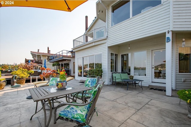 view of patio with a balcony