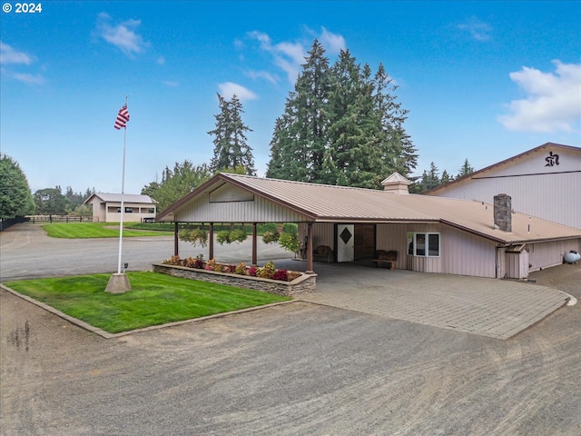 single story home featuring a front yard