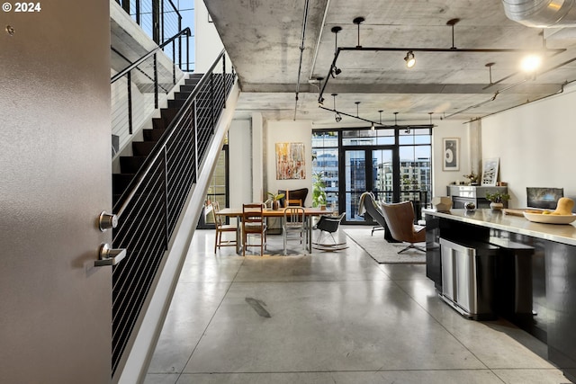 interior space featuring concrete flooring and light countertops