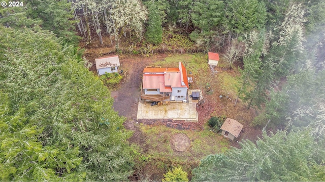 bird's eye view featuring a view of trees