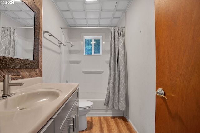 full bathroom with toilet, vanity, shower / tub combo, and hardwood / wood-style flooring