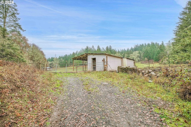 22715 SW Eagle Point Rd, Sheridan, OR 97378 - view of pole building with fence and a wooded view
