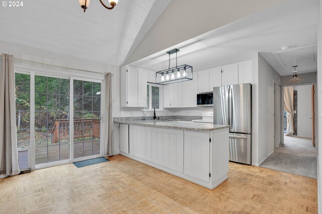 kitchen featuring light stone counters, sink, white cabinets, and appliances with stainless steel finishes