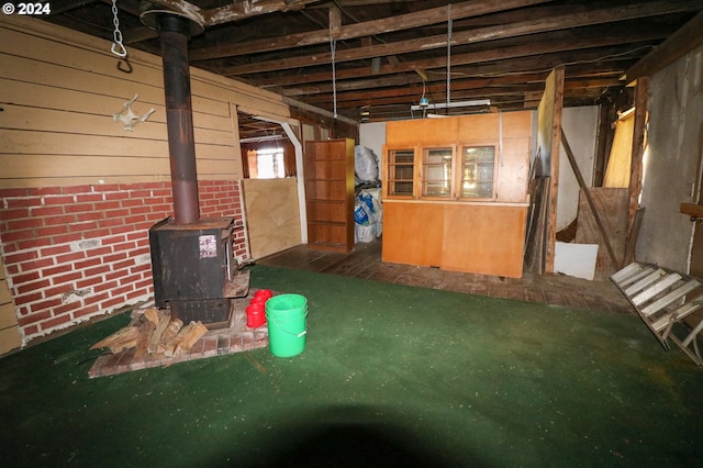 basement featuring a wood stove