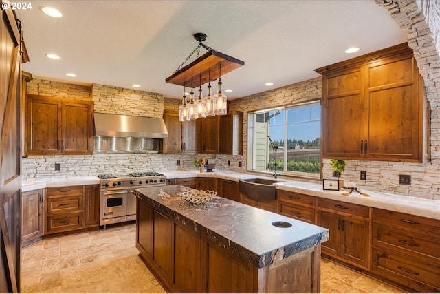 33138 SE Bluff Rd, Boring, OR 97009 - kitchen featuring double oven range, wall chimney range hood, backsplash, a center island, and a sink