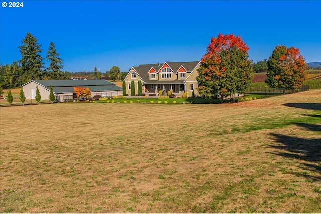 view of front of home featuring a front lawn