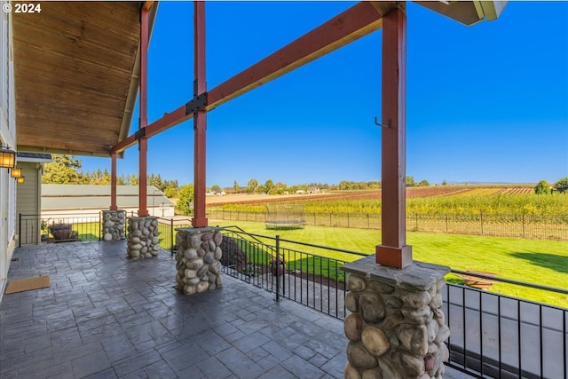 view of patio / terrace featuring a rural view