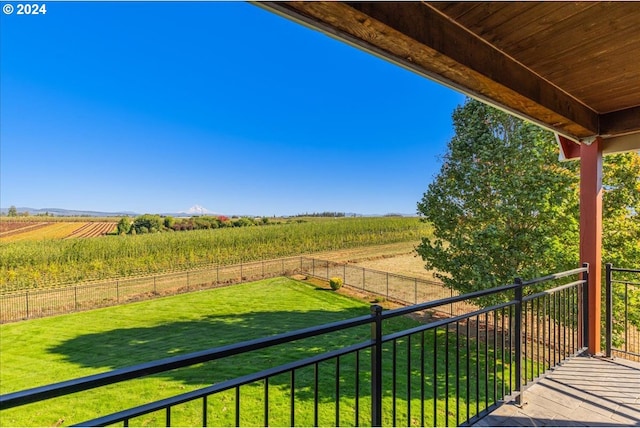 balcony featuring a rural view