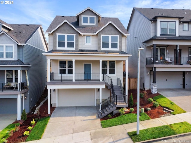 view of front of property featuring a porch and a garage