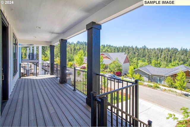 wooden terrace featuring a porch