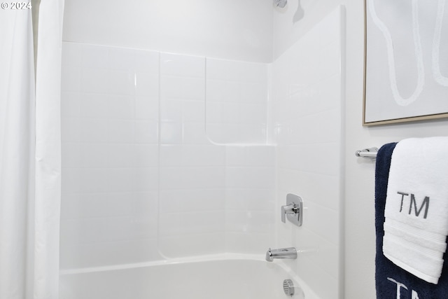 bathroom featuring shower / bath combo with shower curtain