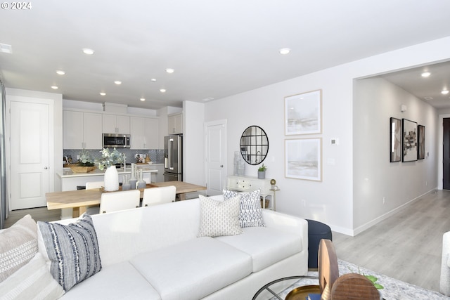 living room featuring light wood-type flooring