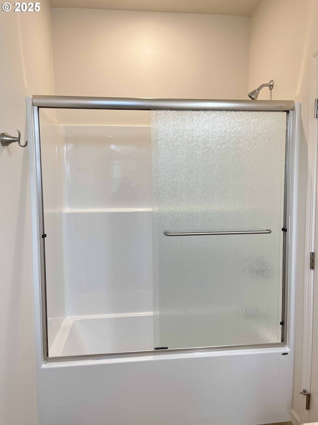 full bathroom with a shower with shower door