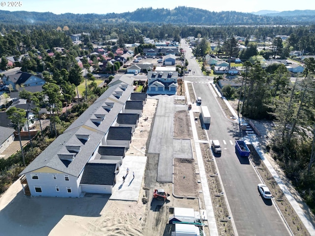 aerial view featuring a mountain view and a residential view
